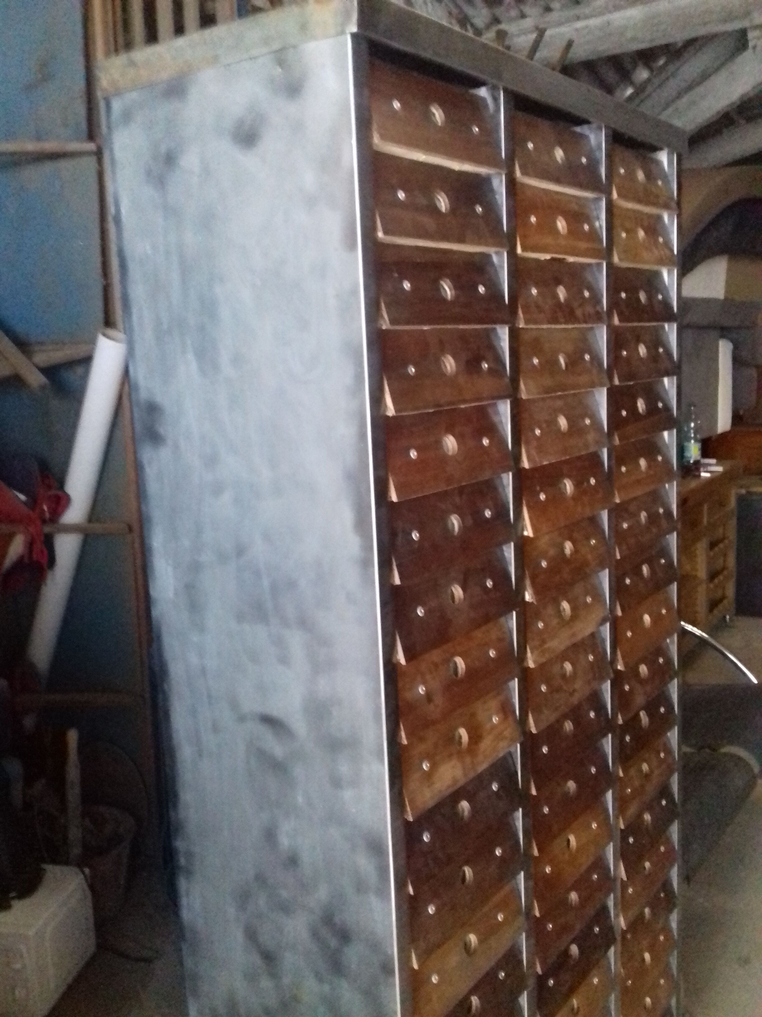 Clem industrial cabinet with 60 A4-sized drawers and riveted walnut fronts