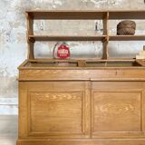 Wooden hardware cabinet painted with wood effect, circa 1940.
