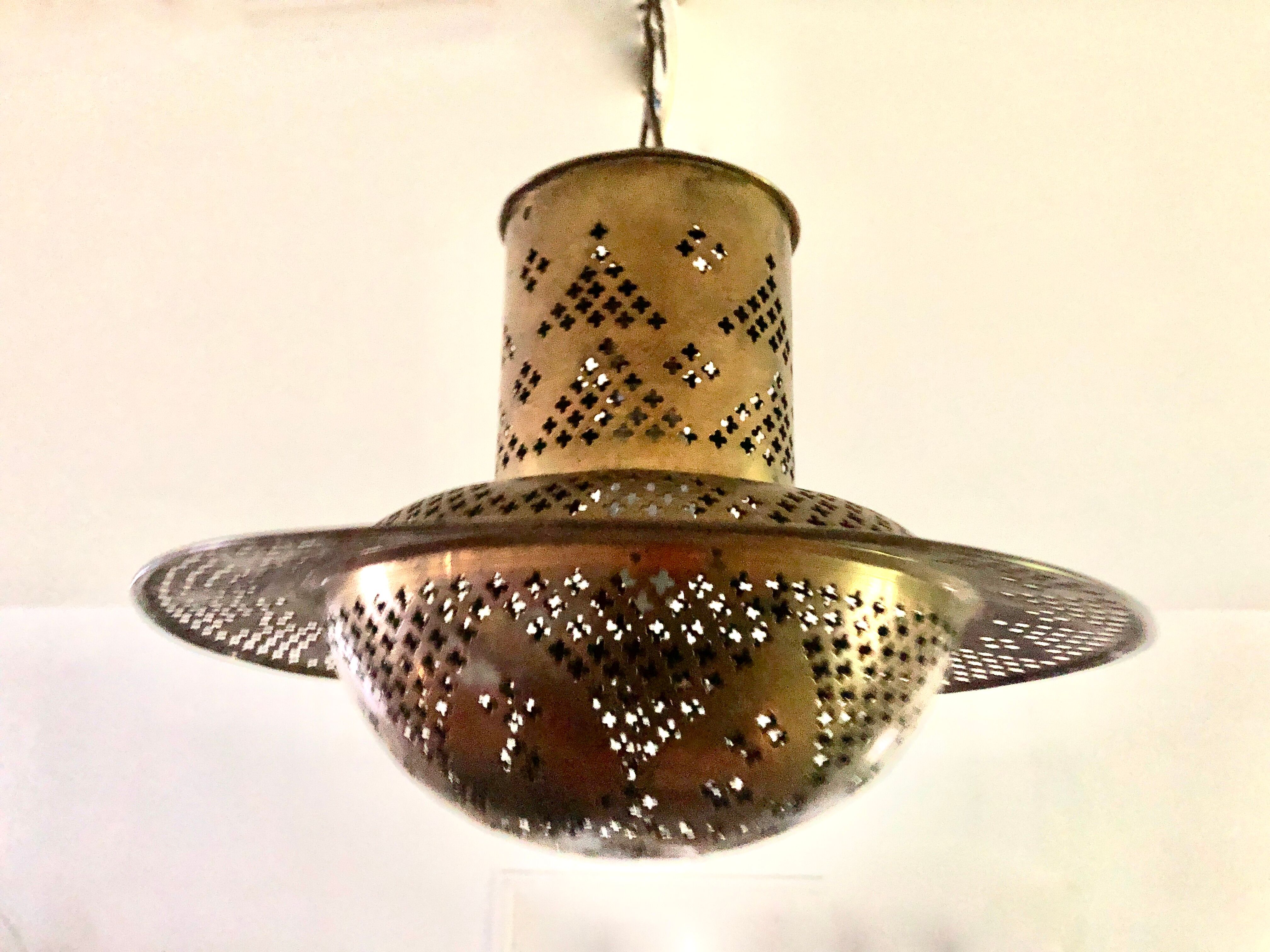 Perforated gilded metal lantern
