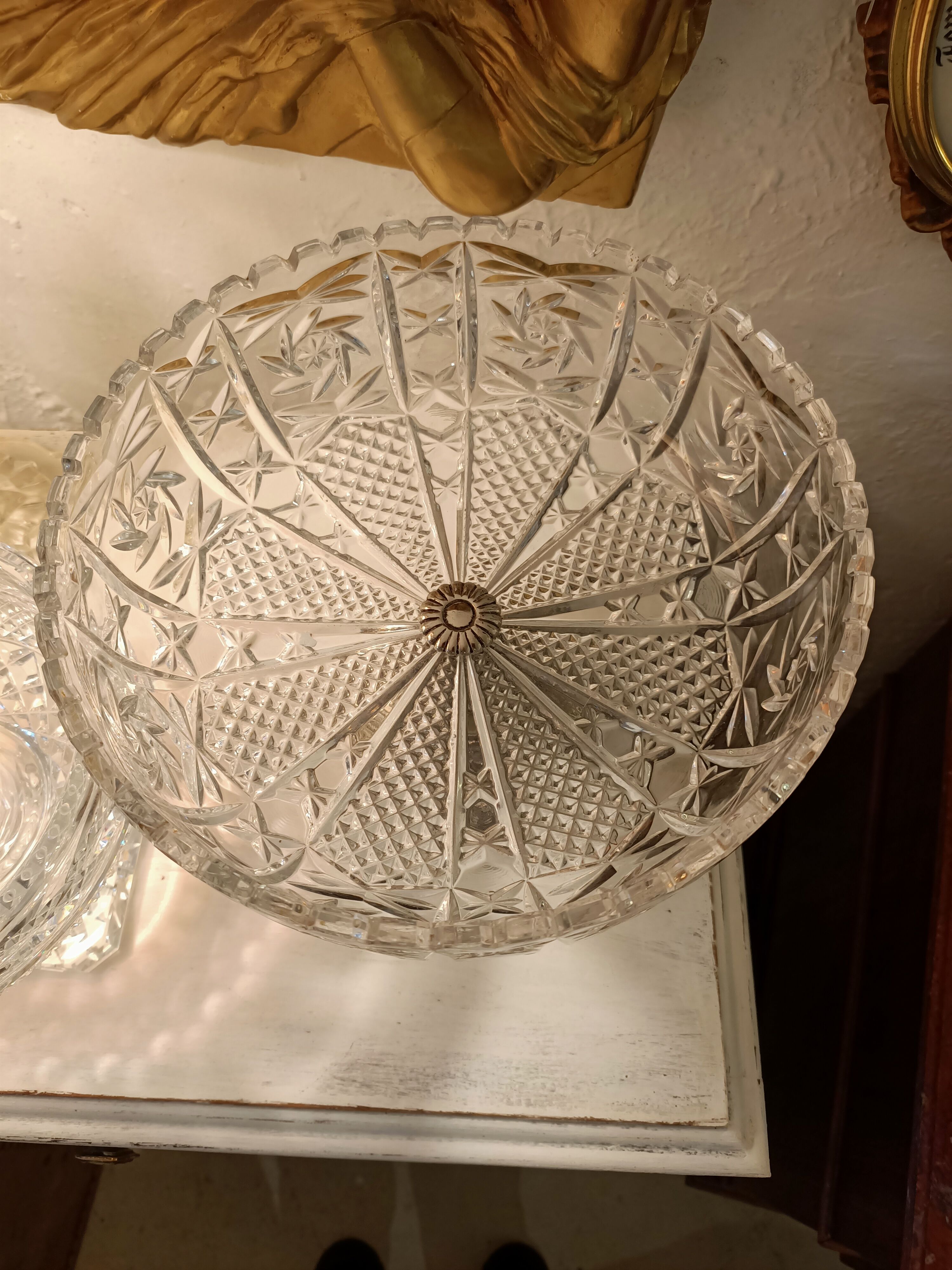 Crystal cut, silver metal.