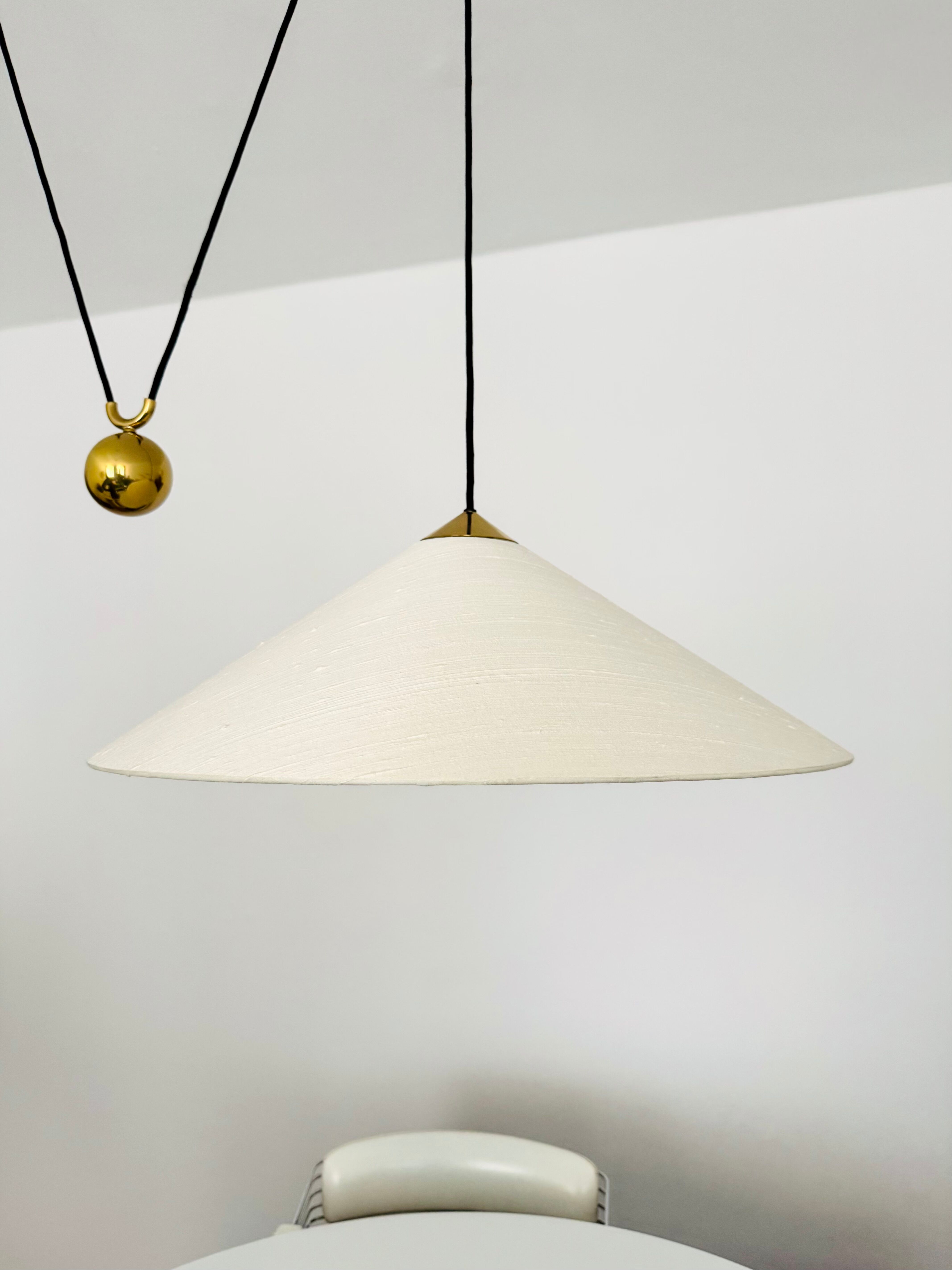 Large Adjustable Brass Pendant Lamp with Counterweight by Florian Schulz