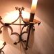 Paire d'appliques en métal doré à décor de trèfles