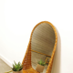 Vintage rattan mirror with storage shelf