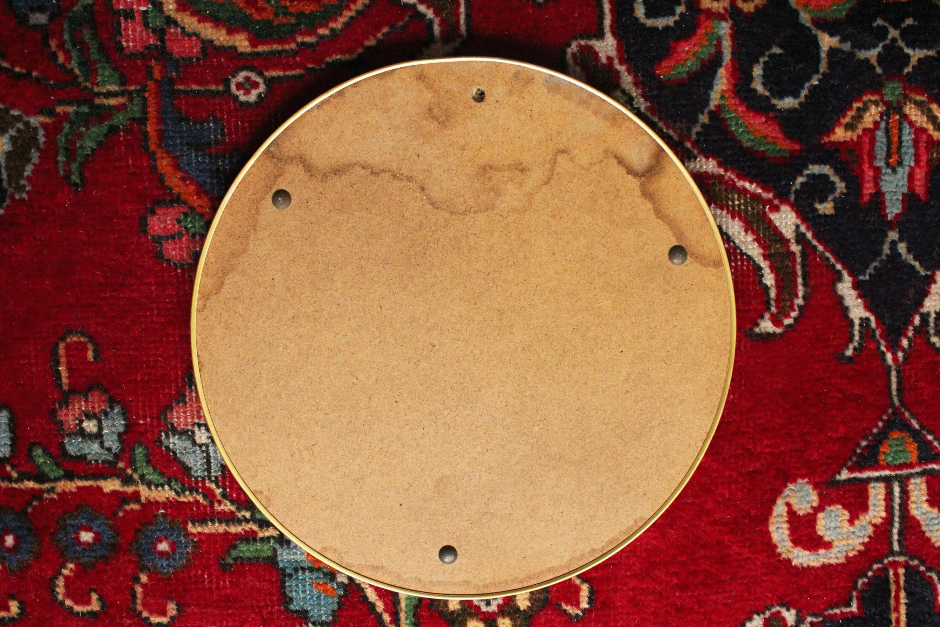 Miroir vintage rond  bordure acier doré