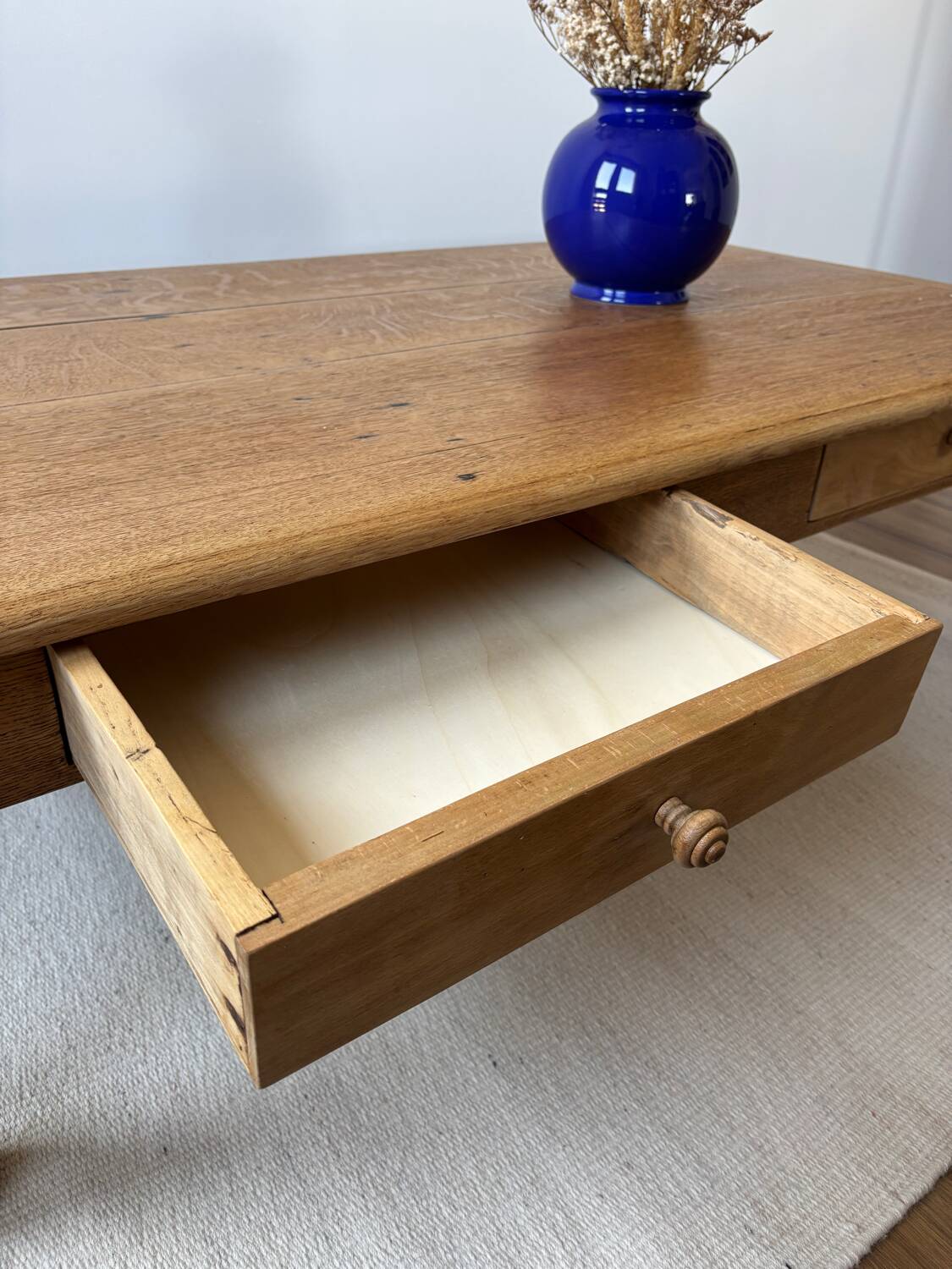 Large farmhouse-style coffee table with drawers, renovated oak.