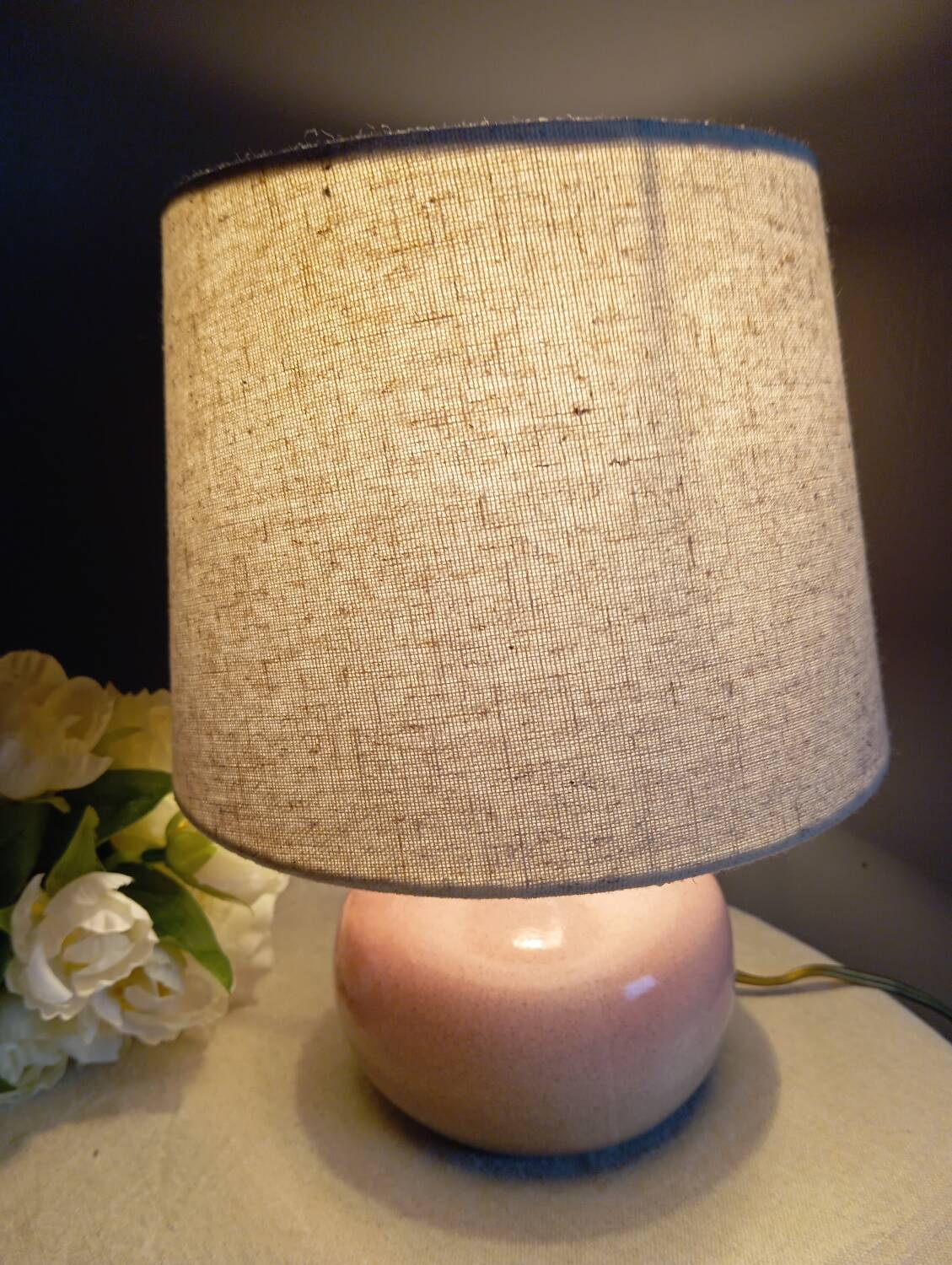 Signed speckled pink ceramic bedside lamp, linen lampshade