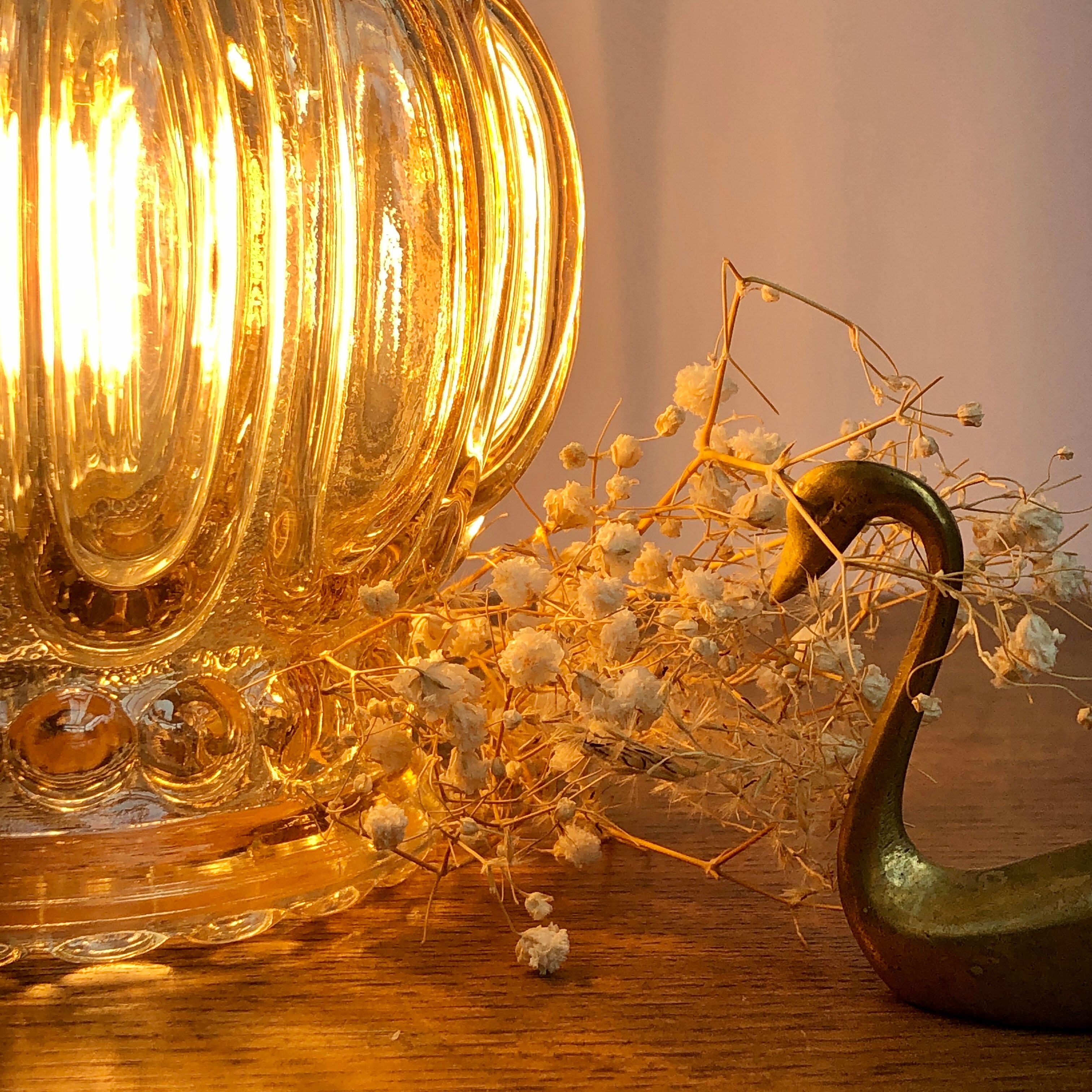 Vintage amber glass globe hand lamp