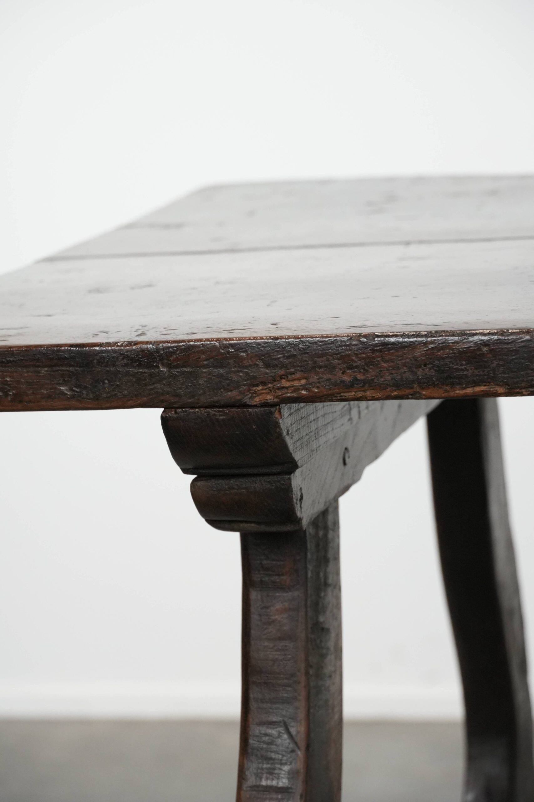 Antique Spanish table from the early 18th century with  a cast iron base
