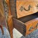 Louis XV style jump commode with marquetry and marble decoration.