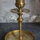 Duo of solid brass and gold metal candle holders worked old
