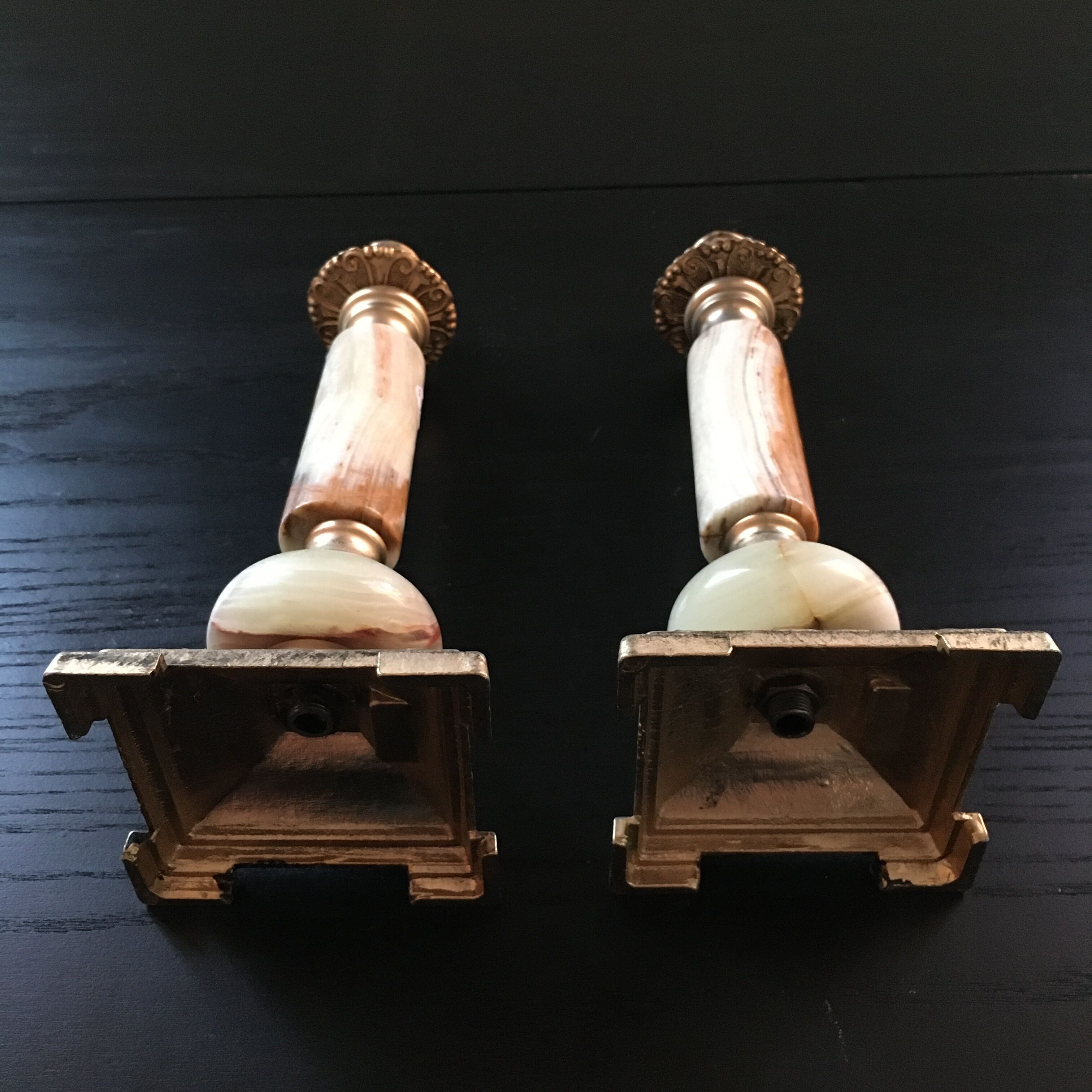 Pair of alabaster and brass candle holders