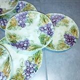 Set of 12 antique earthenware plates in slip with grapes and vines