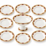 Porcelain service MG early 20th century 8 plates and 1 compote dish.