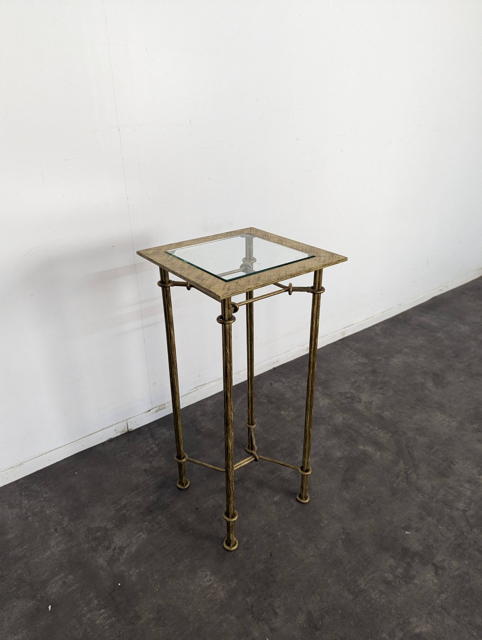 Wrought iron side table in the style of Diego Giacometti.