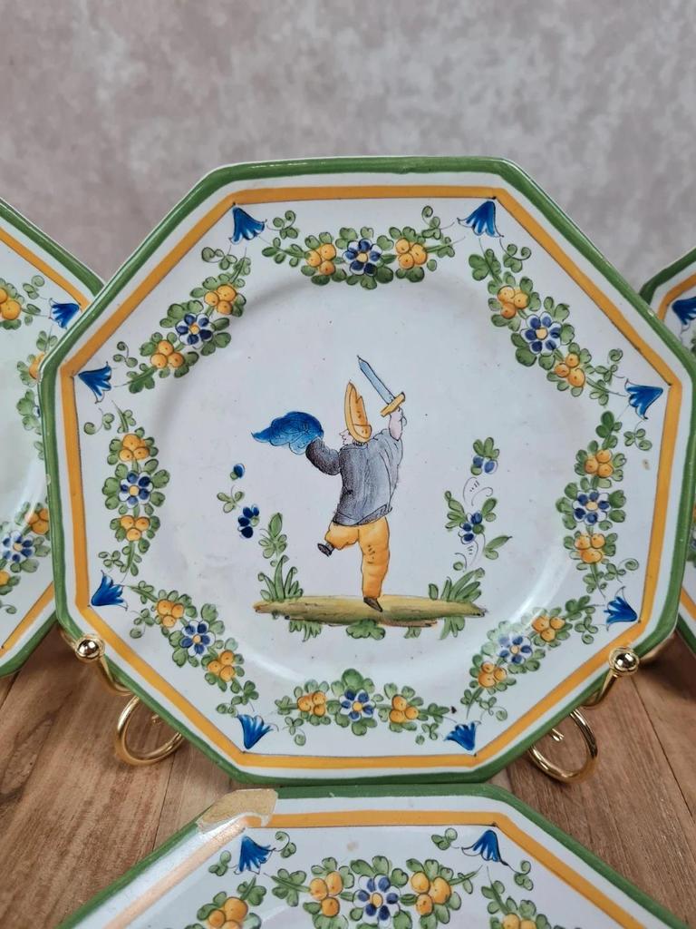 Set of 12 small antique plates by Alfred Renoleau, different designs.