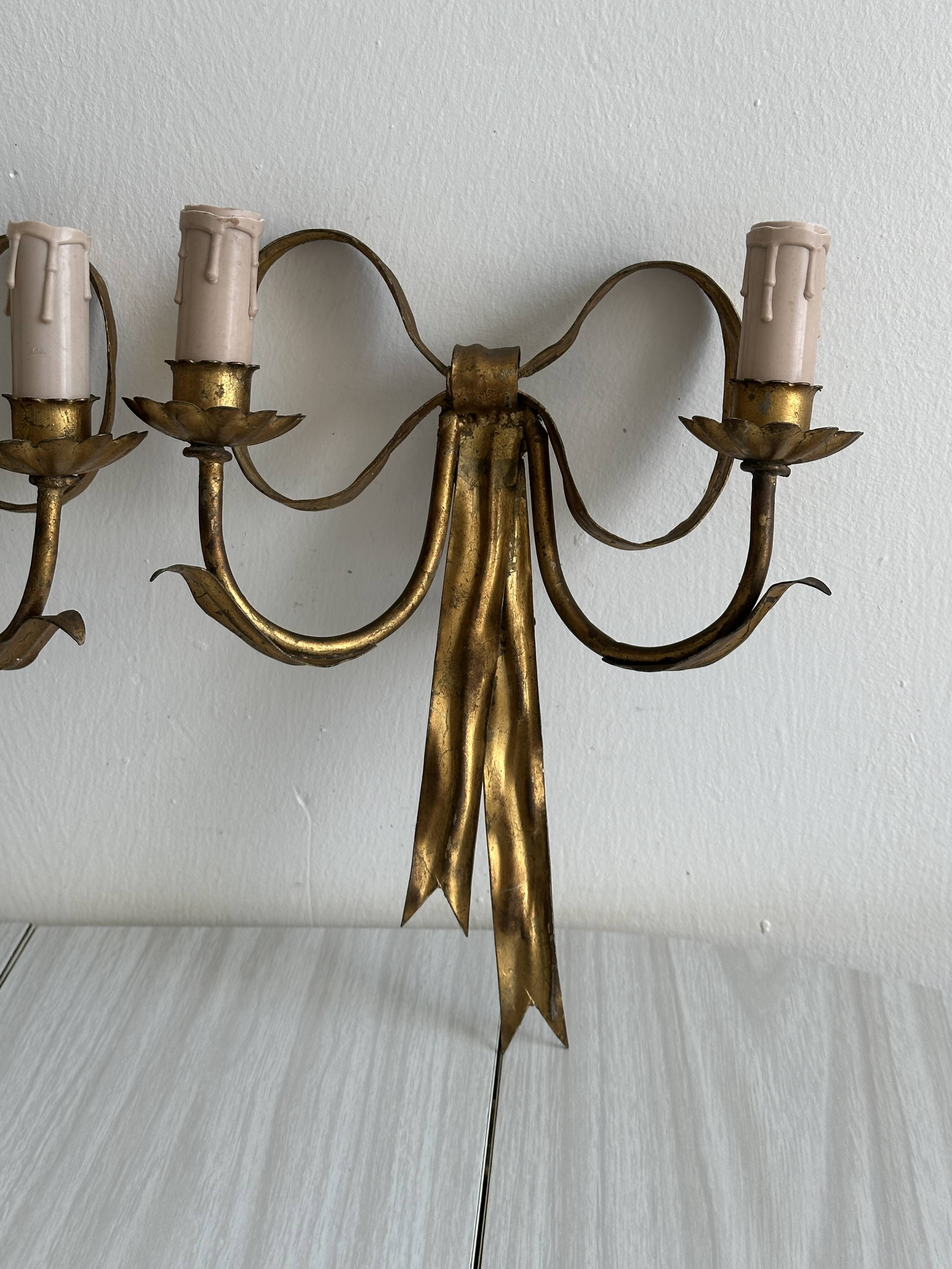 pair of antique metal wall lights