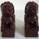 Vintage wooden pair of Foo dogs.