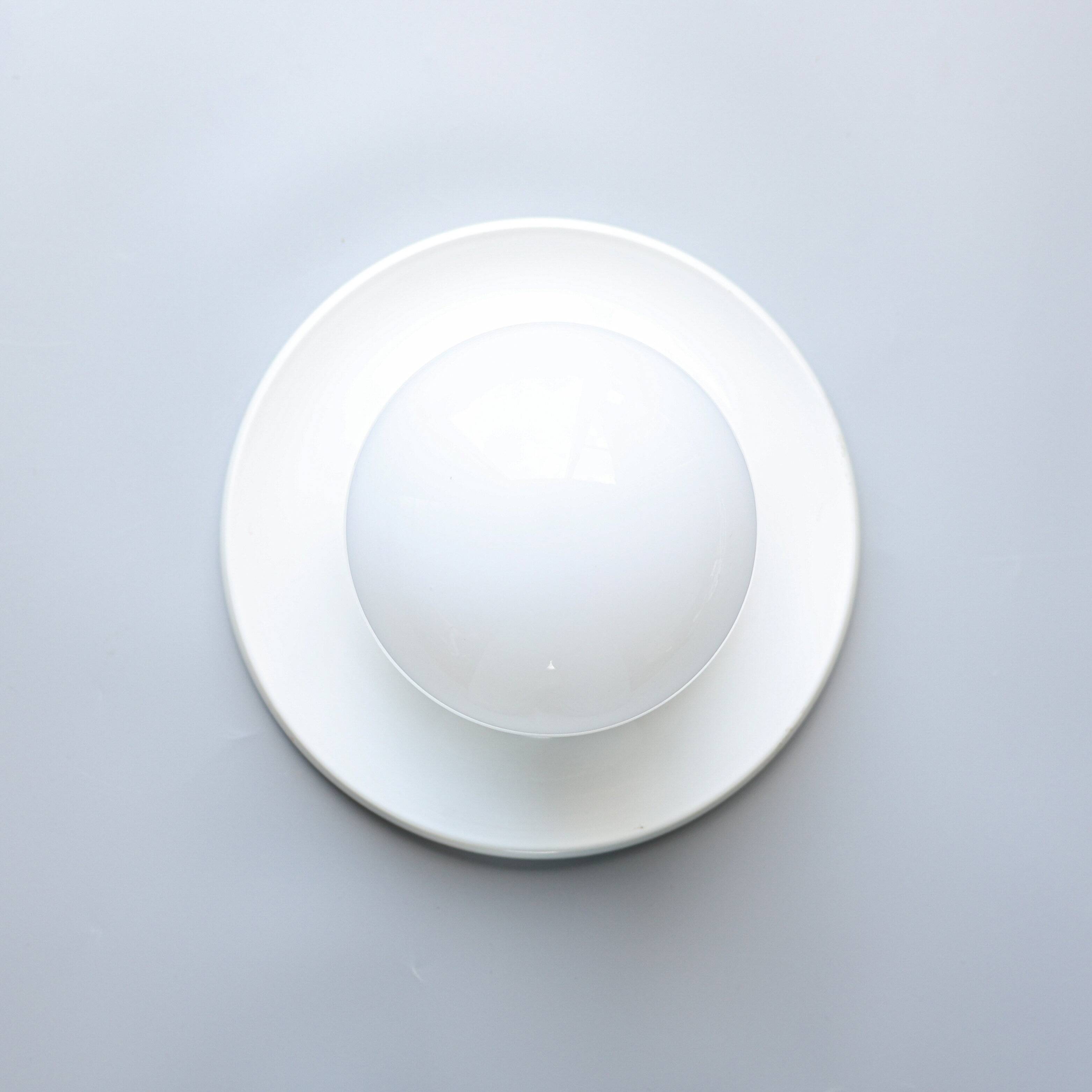 Light ball sconce by Achille & Pier Giacomo Castiglioni, 1970s, Italy.