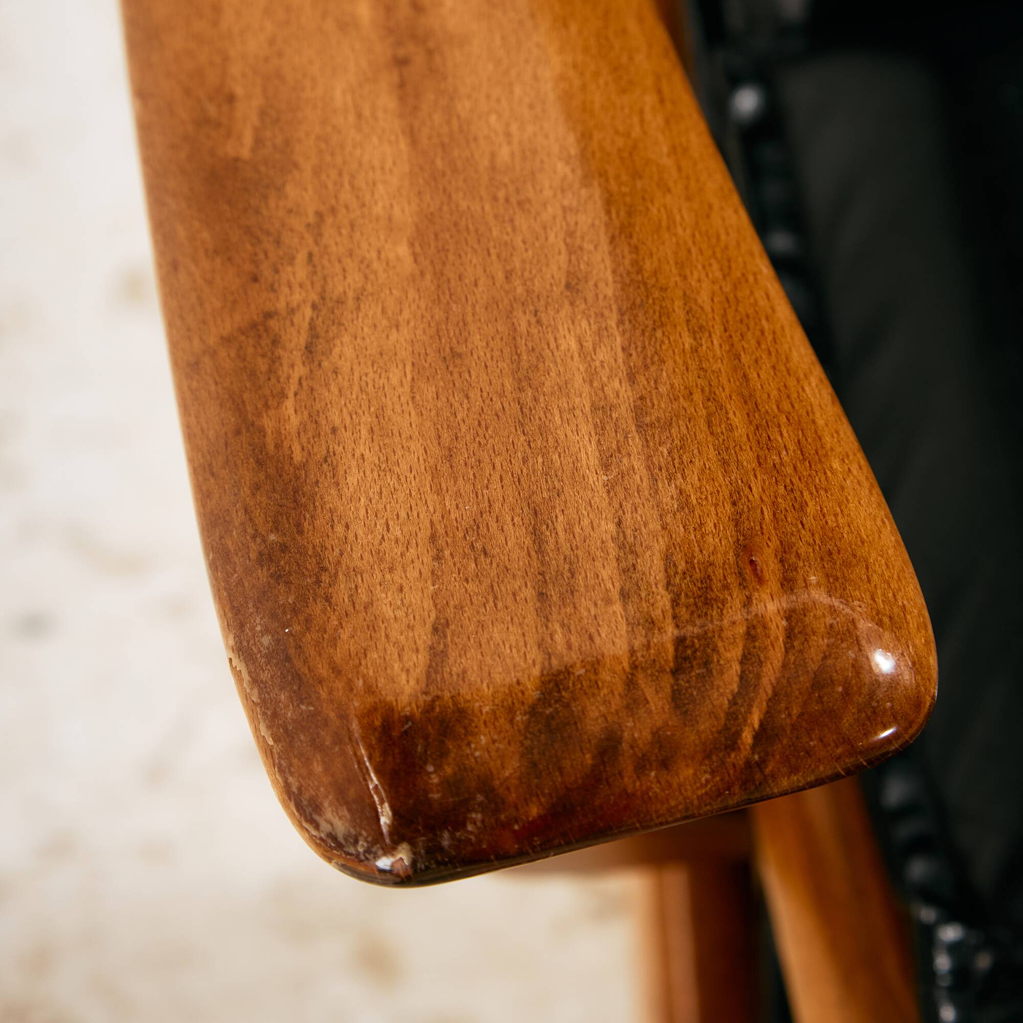 Beech armchair with leather upholstery