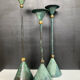 Postmodern metal candlestick trio
