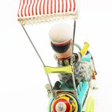 Old mechanical key toy in lithographed sheet metal