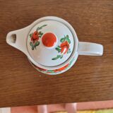 Small vintage coffee or teapot with orange flower pattern