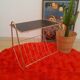 Pedestal table, door magazines in gilded metal years 50 - 60