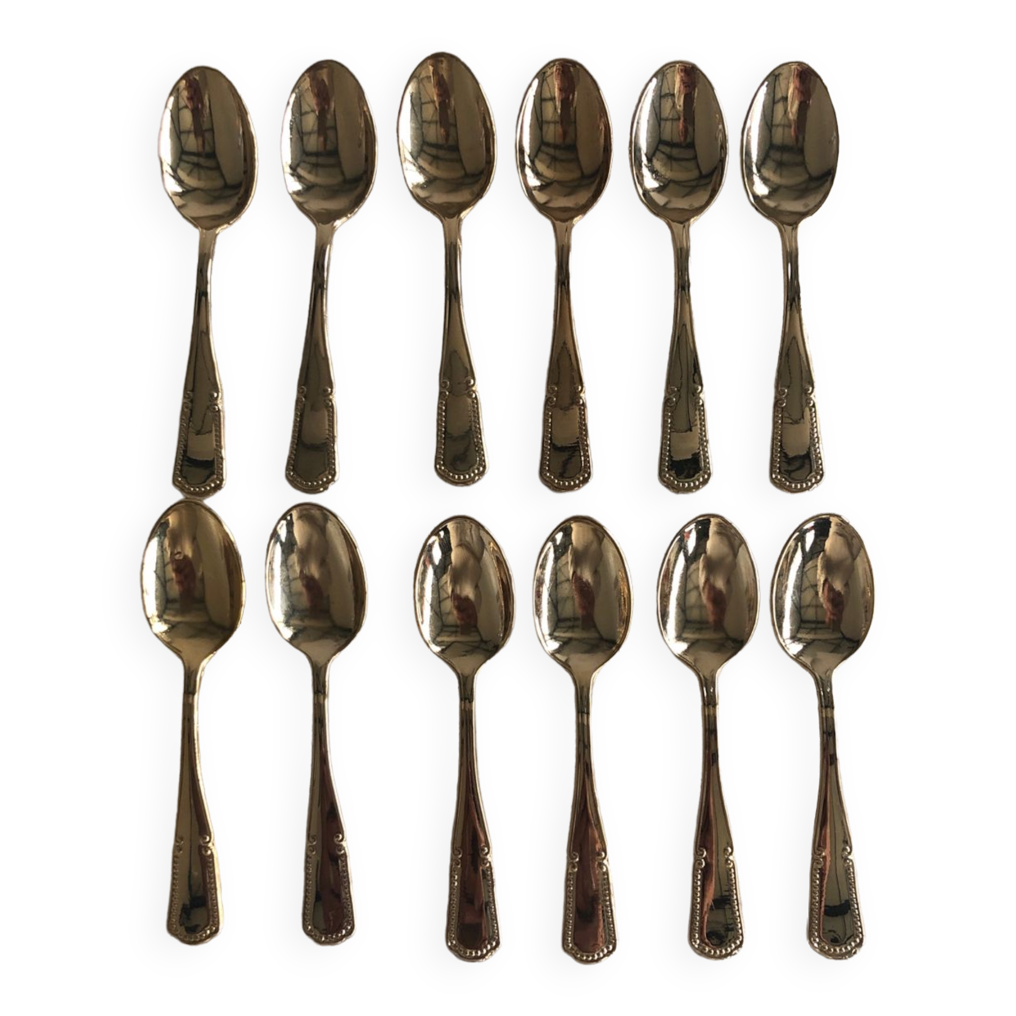12 small teaspoons in Vintage golden metal