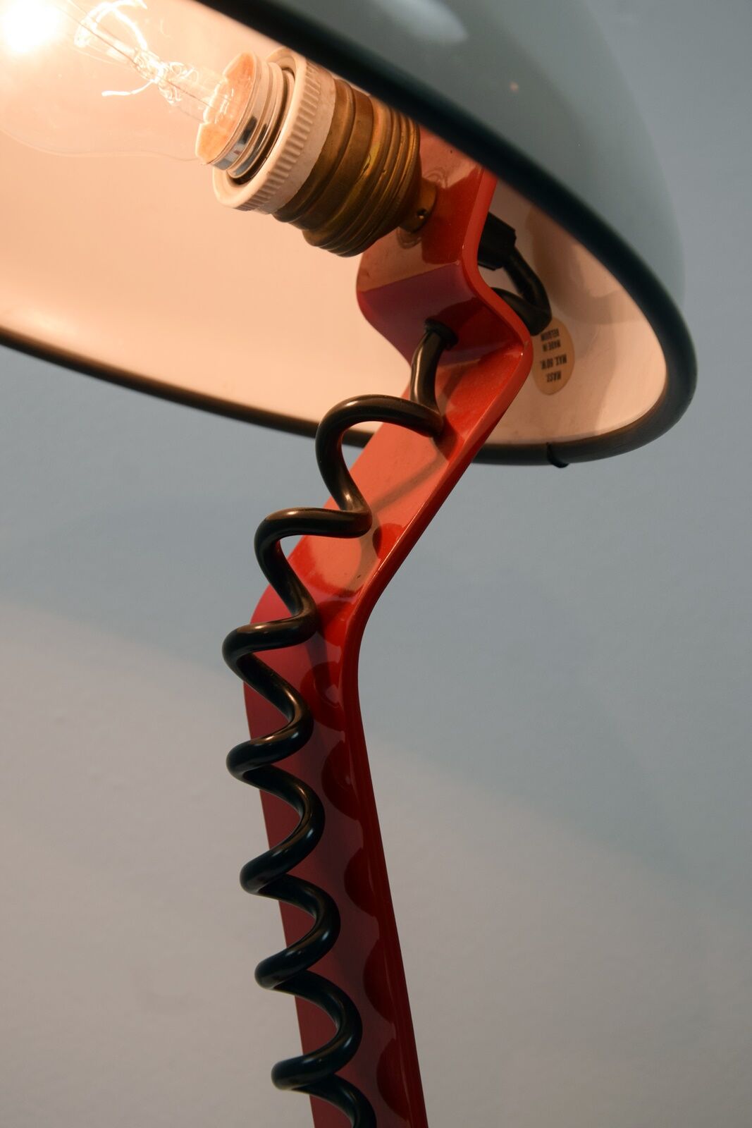 White and red steel desk lamp