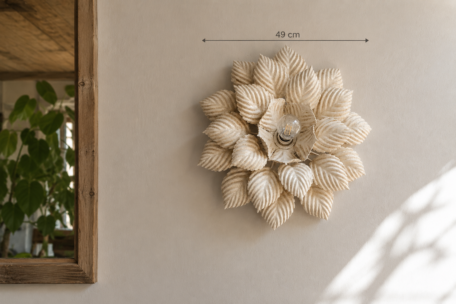 Flower applique attributed to Masca, 52cm in diameter.