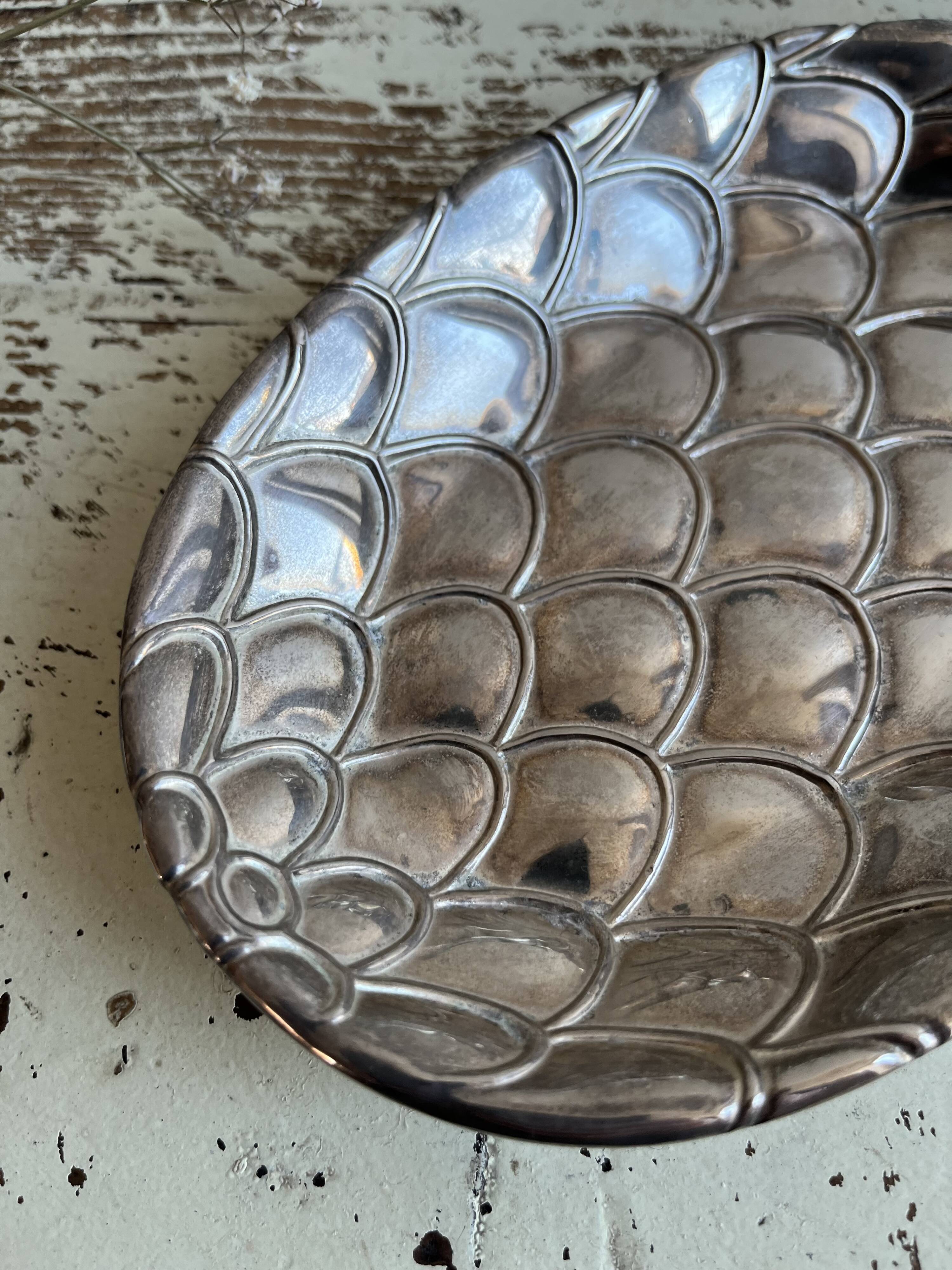 Silver-plated pineapple pocket emptier