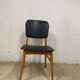 Chaise vintage : bois et cuir skai noir