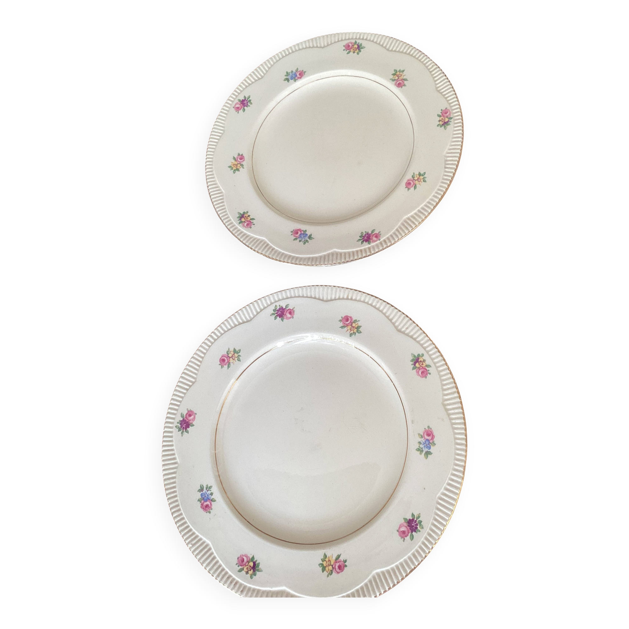 Two identical vintage Clarice Cliff plates from the Newport Pottery.