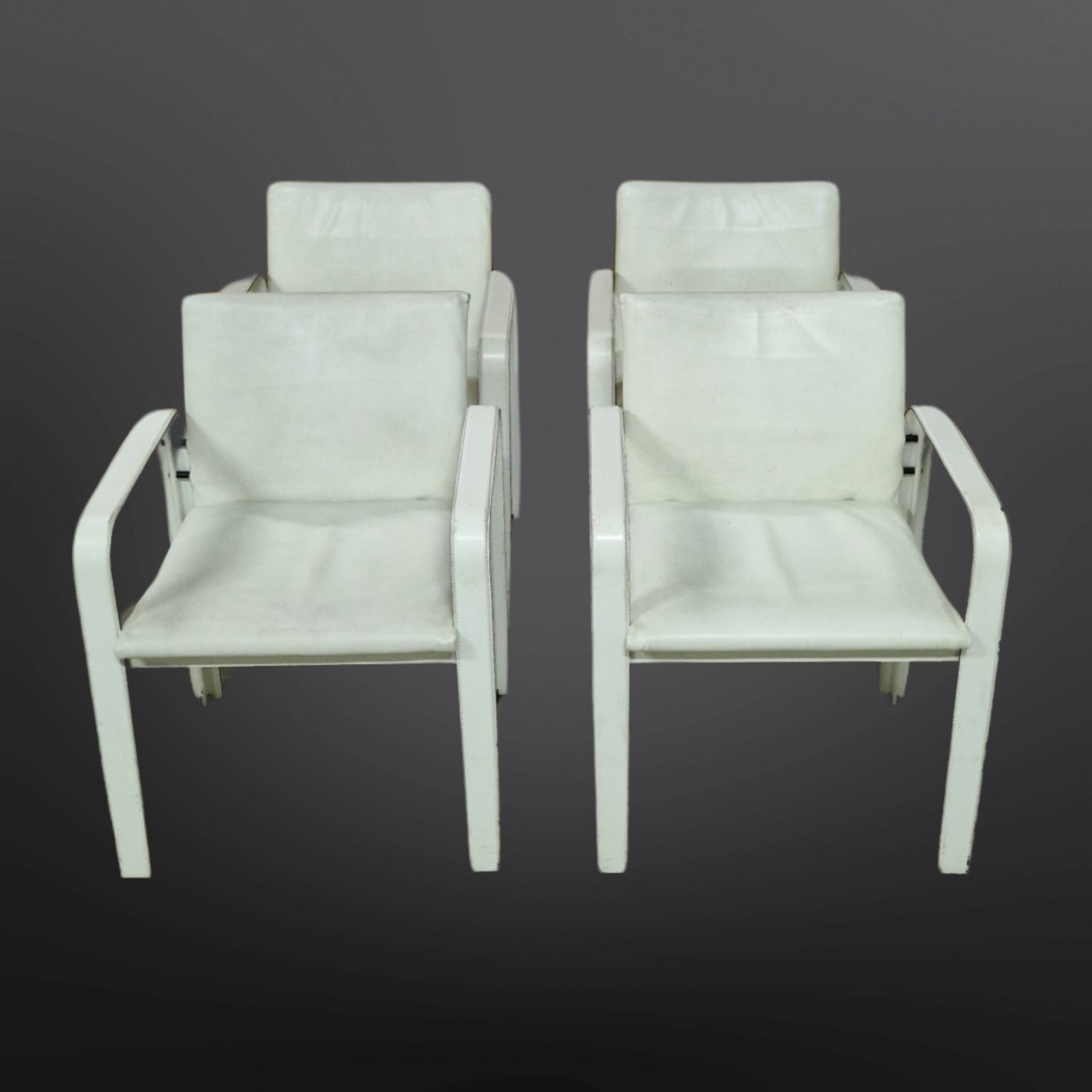 Set of 4 leather dining chairs by Jacques Toussaint and Patrizia Angeloni for Matteo Grassi. Italy 1