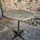 Bistro table / old garden with a cast iron base and stone top, France