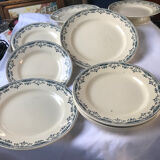 Round serving dish from the Longchamp earthenware factory, Doria model. Iron Land
