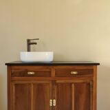Vanity unit in solid walnut and Zimbabwean granite.