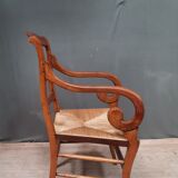 Rustic straw armchair with butts
