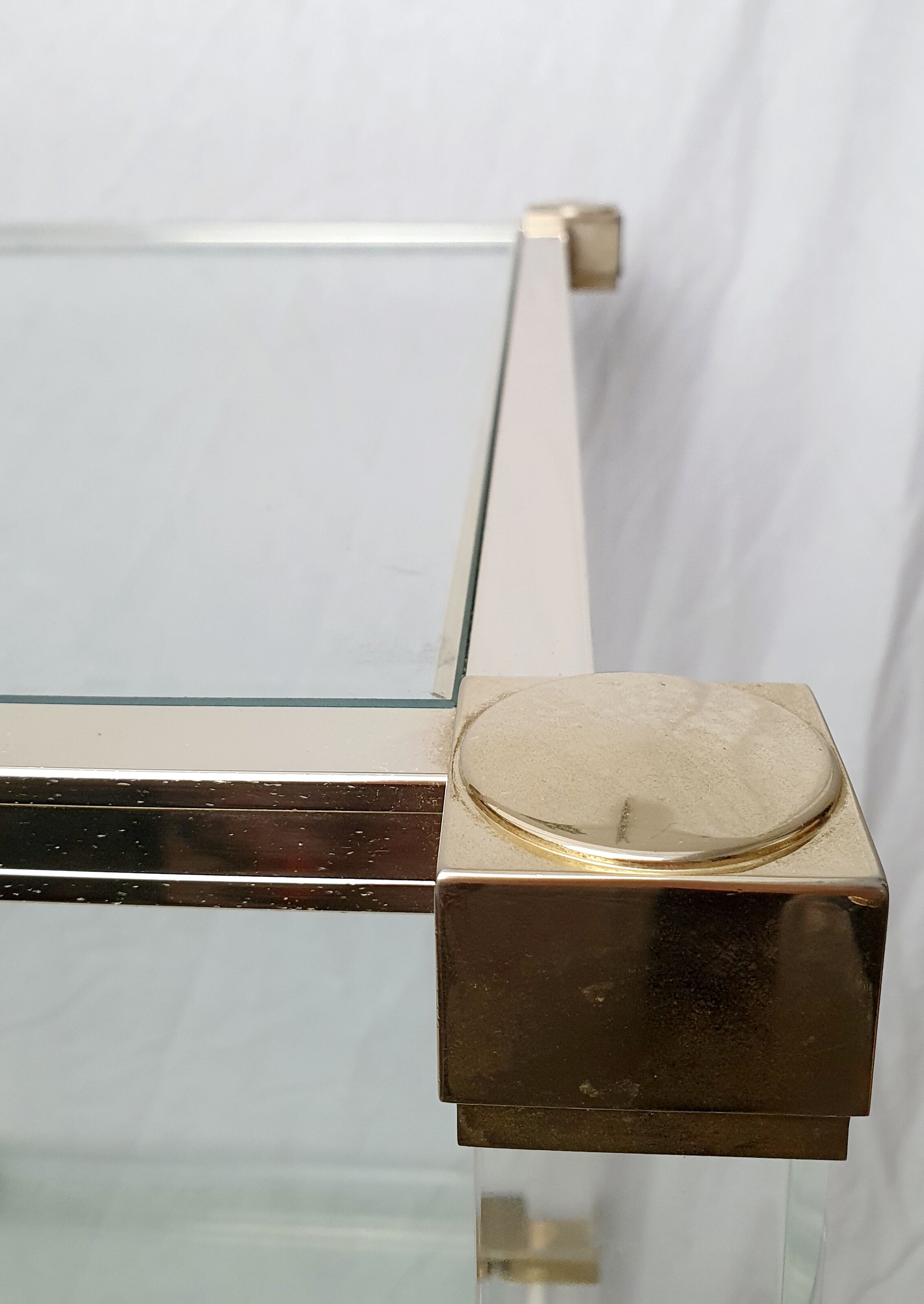Rolling glass and plexiglass shelf by Pierre Vandel