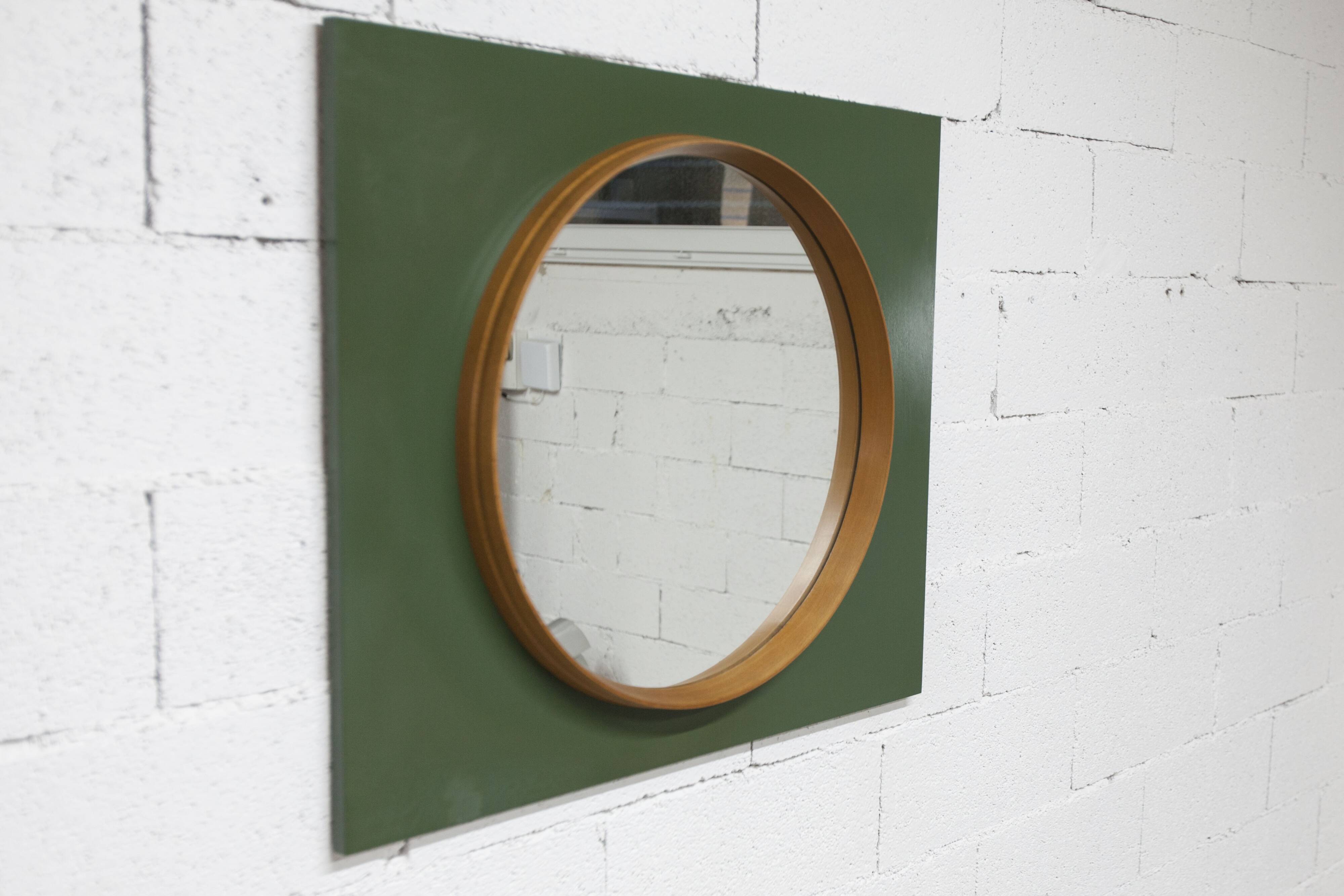Unusual round wall mirror 60 cm teak edge on green rectangular board 1960.
