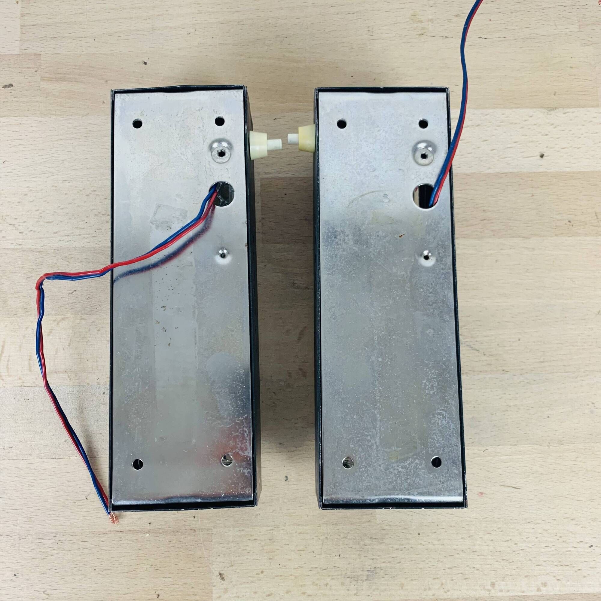 Pair of molded glass and metal wall lights from the 1950s