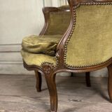 Pair of louis xv style armchairs in carved beech around 1920