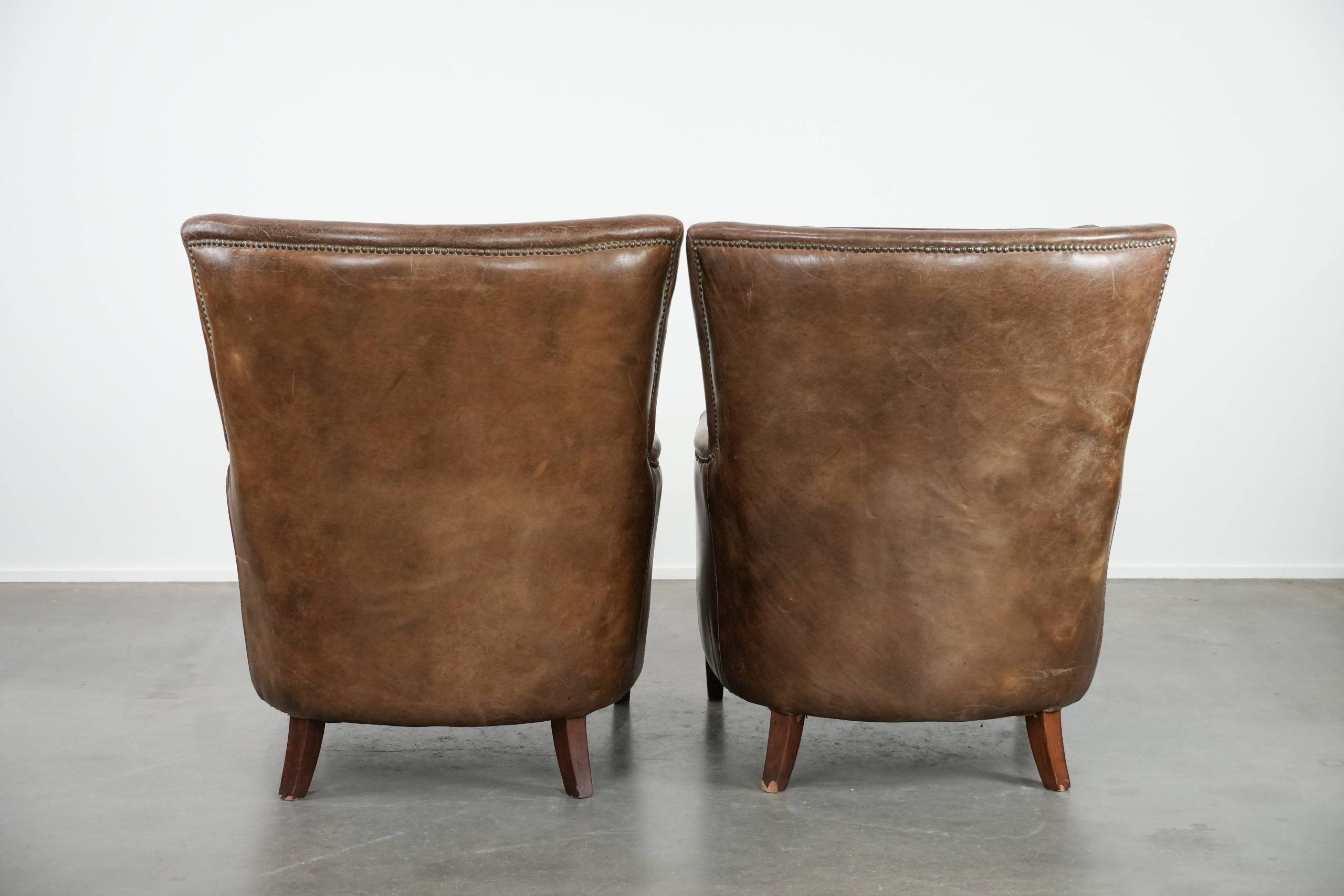 Very comfortable set of two vintage cowhide leather armchairs