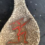 Glassed ceramic cut enamelled prehistoric warrior motif vintage red 1950