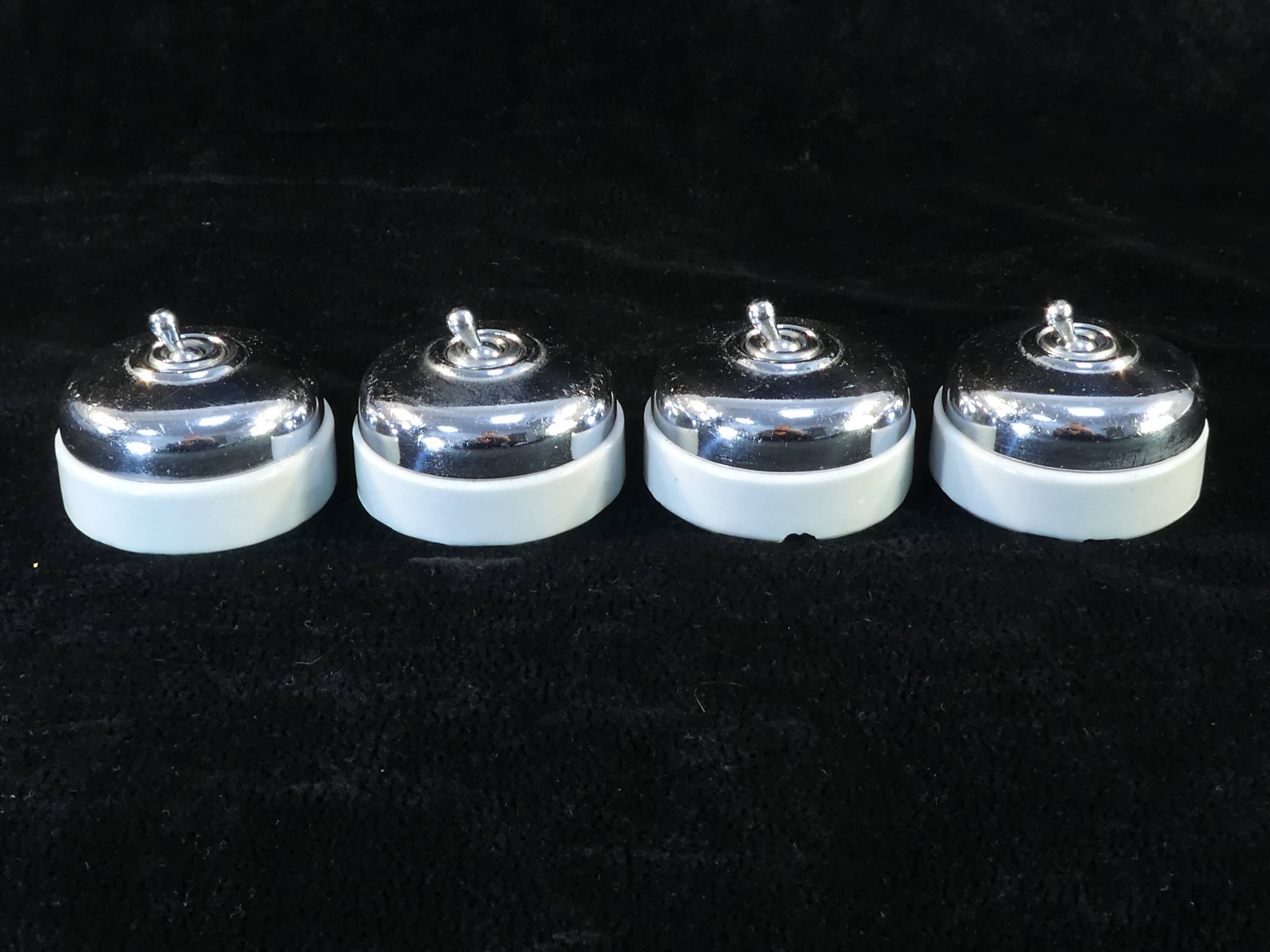 Set of 4 old porcelain and chrome switches
