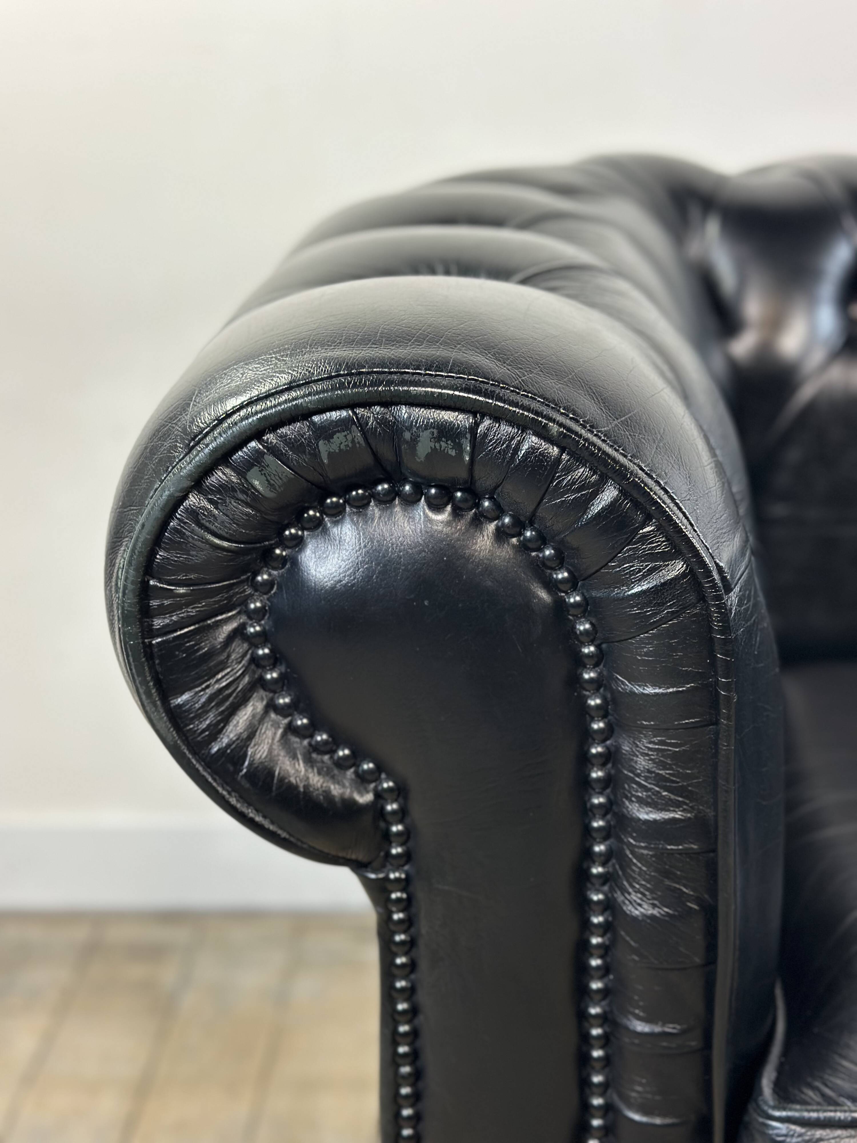 Vintage 1980 black leather Chesterfield sofa