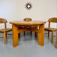 Extendable round table Maison Regain in solid elm, 1970s design.