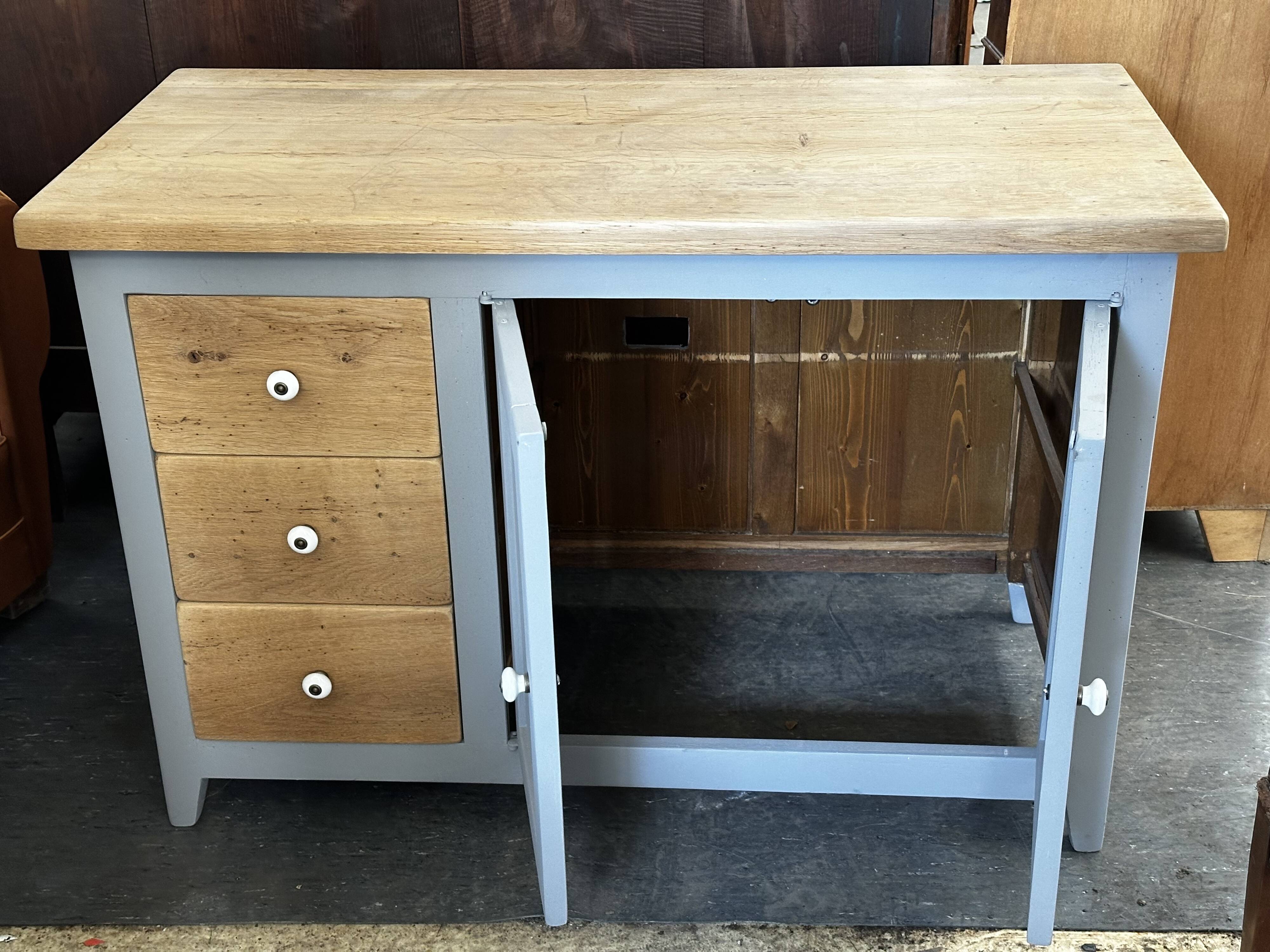 Vintage sideboard painted in gray and raw wood
