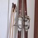 Antique wooden skis with vintage poles