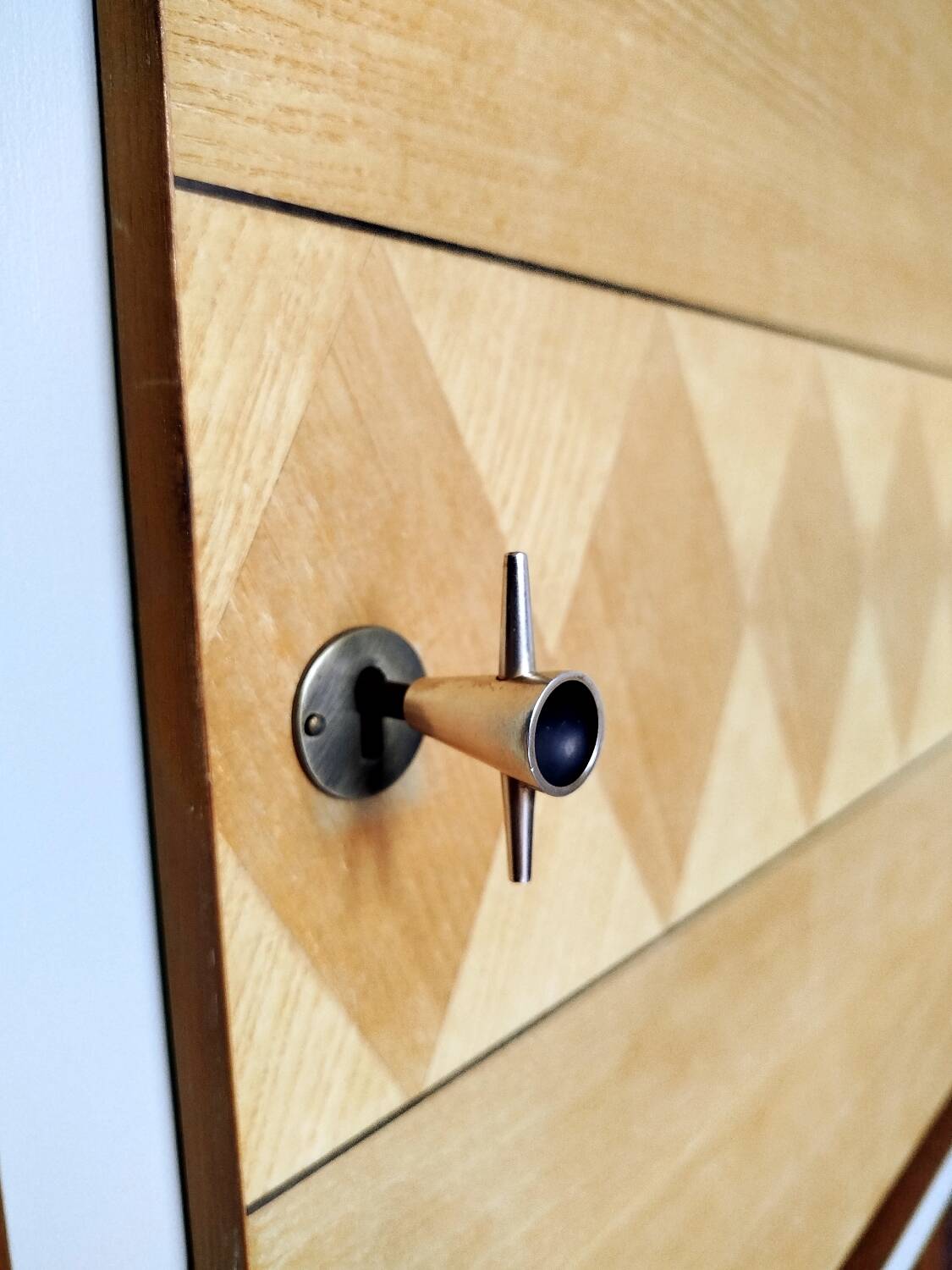 Wooden sideboard in soft green